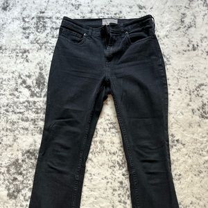 Black Everlane jeans, light wear